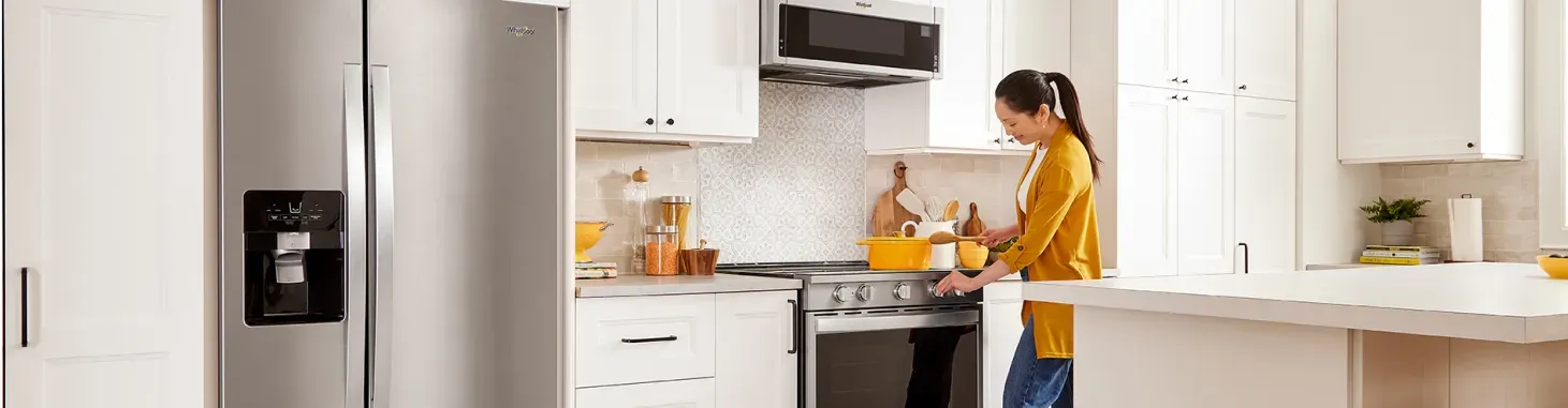 woman cooking in modern kitchen